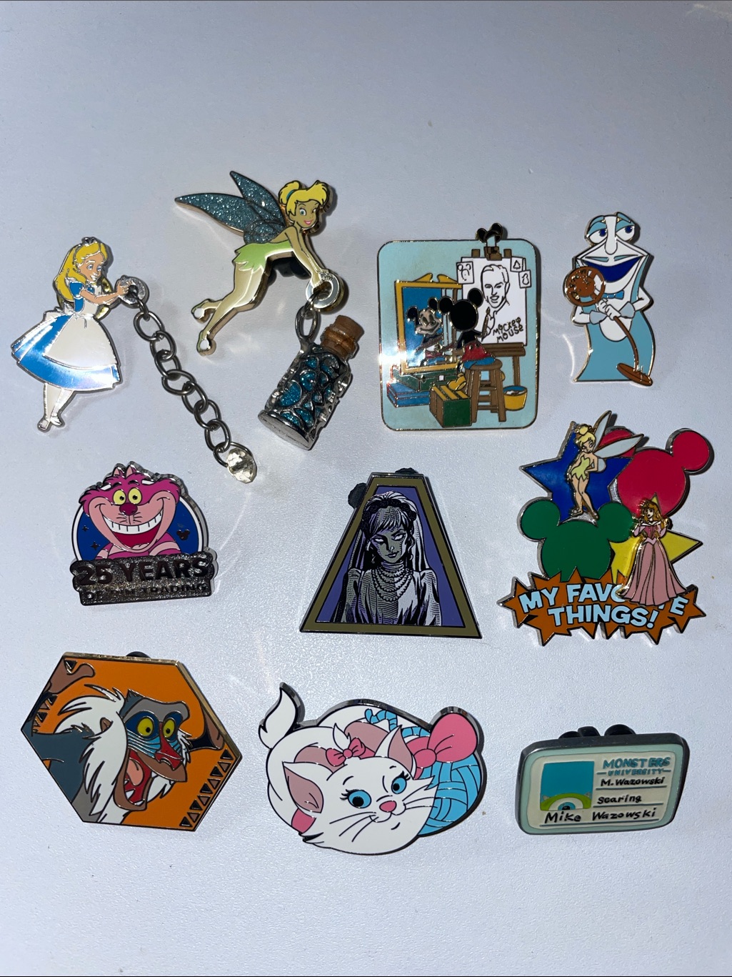 A collection of Disney trading pins photographed for a US resale marketplace listing